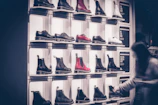 Set of Promes boots with different interchangeable modules displayed on a black surface.