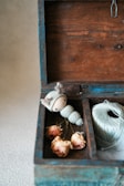 A cozy arrangement of heartwarming tokens inside a rustic wooden box.