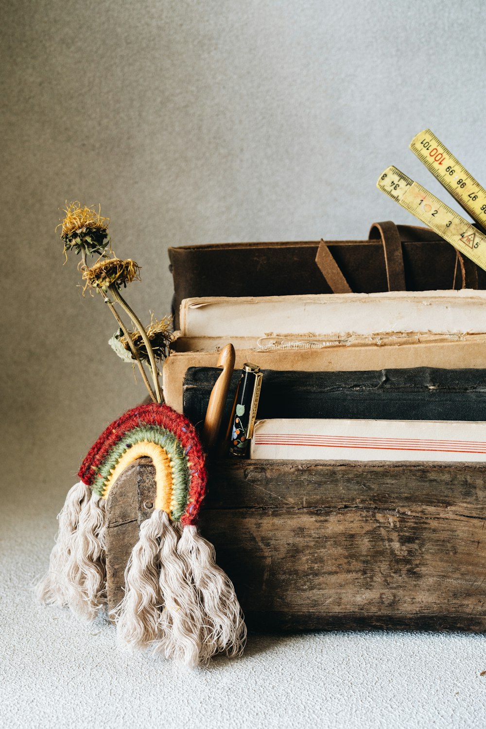 a wooden box filled with lots of different items