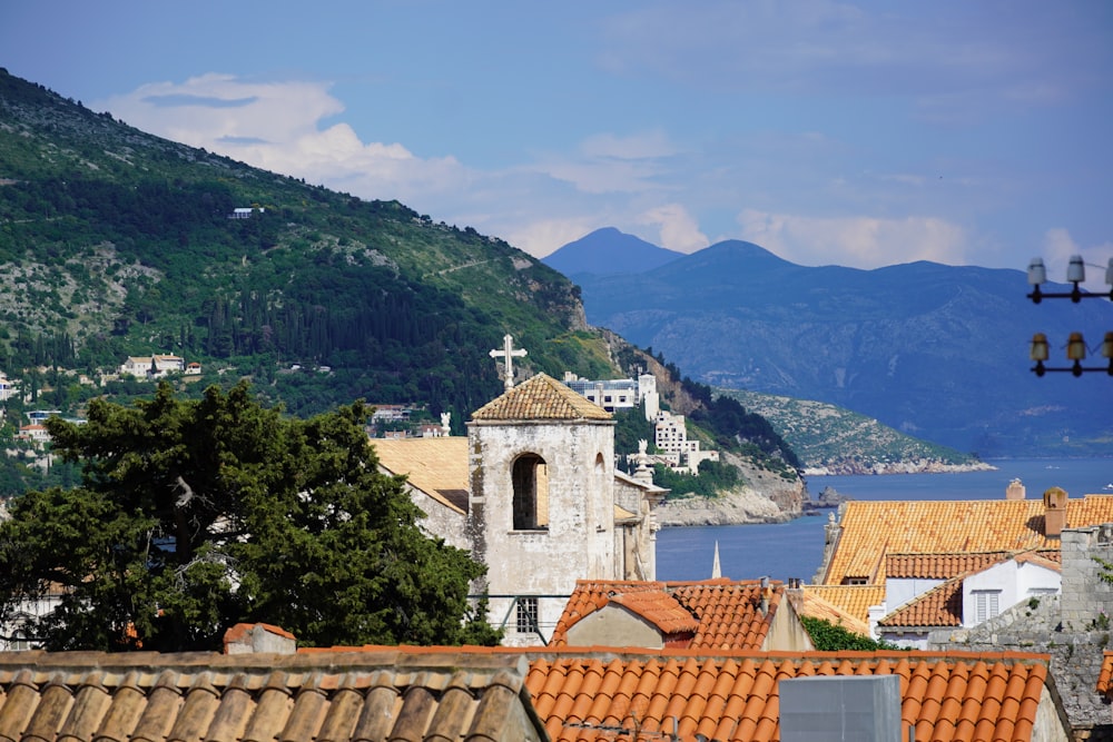 a view of a city with mountains in the background