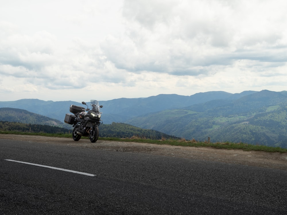 a motorcycle parked on the side of a road