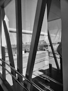 Black and white render of Mérida airport renovation with structural details.