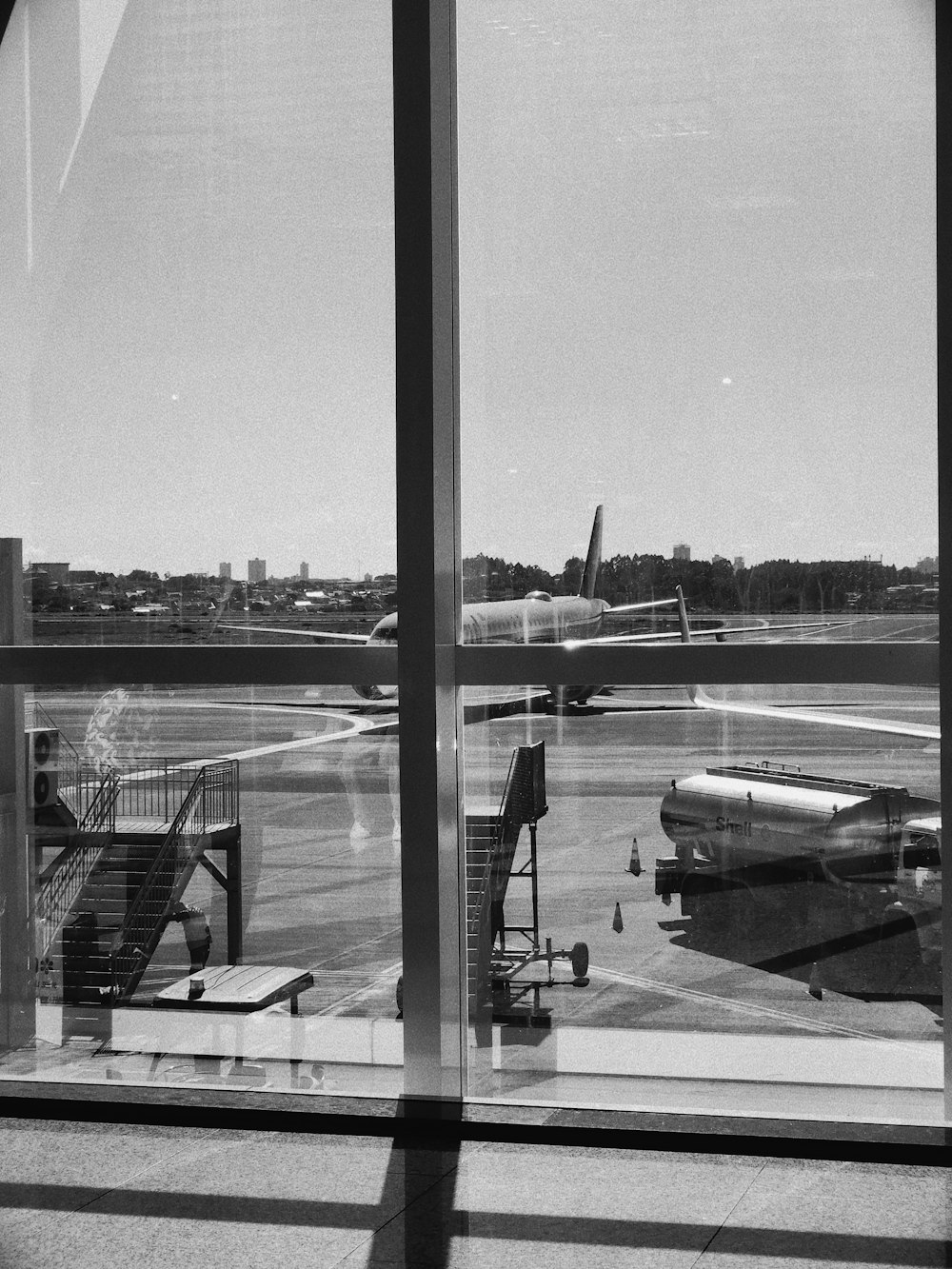 a black and white photo of an airport