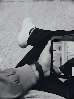 Neutral silhouette of a person interacting with a digital learning interface.