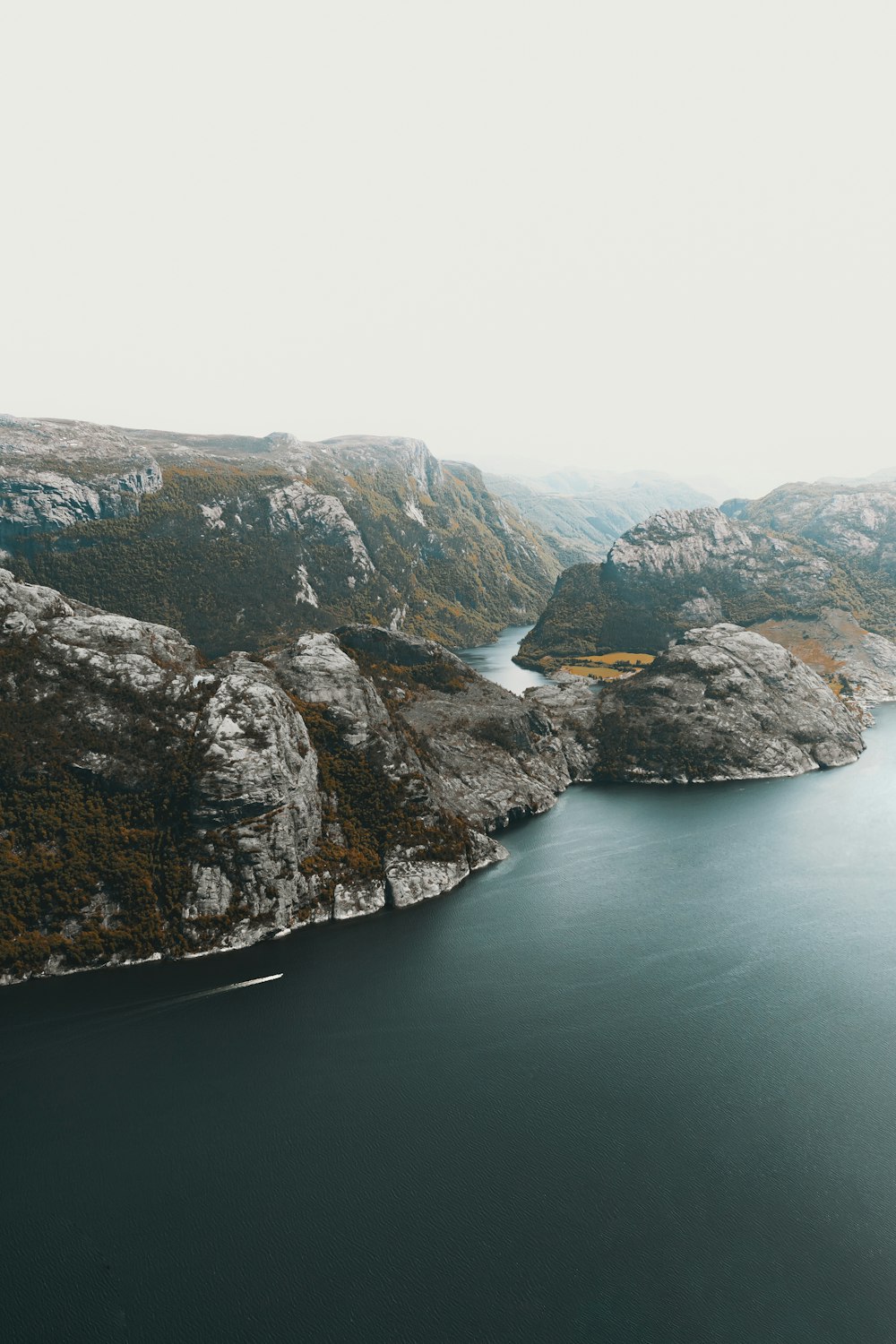 a large body of water surrounded by mountains