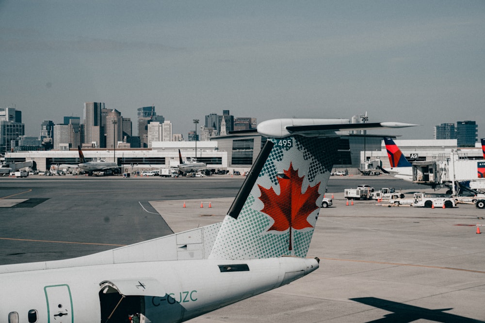 a large jetliner sitting on top of an airport tarmac