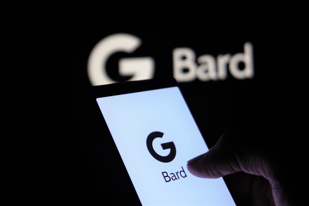 a person holding a cell phone in their hand, Google Bard