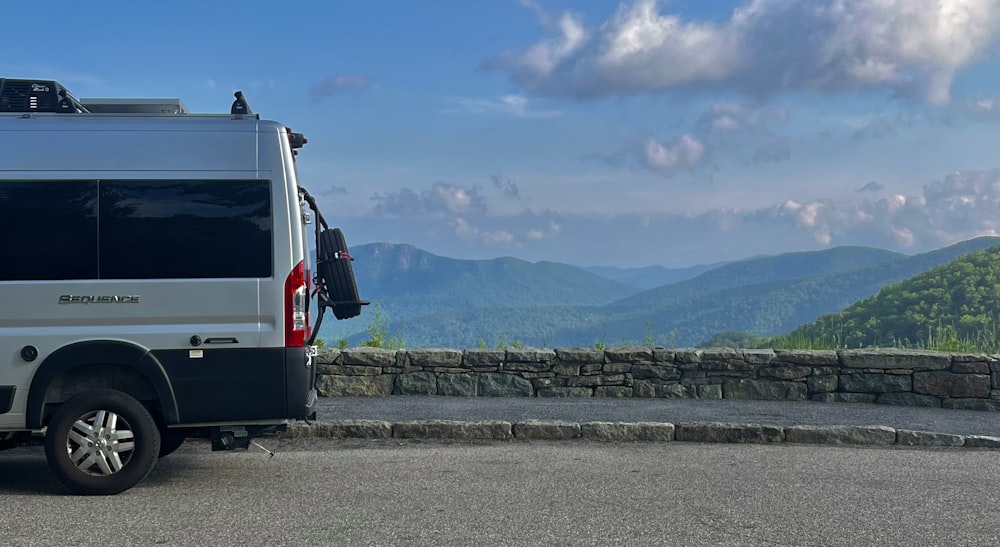 a white van parked on the side of a road