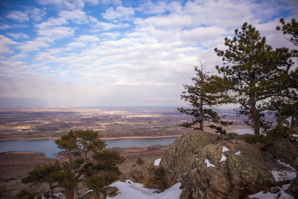 a view of a lake from a mountain top