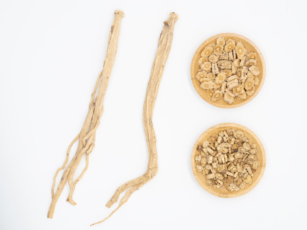 a couple of wooden bowls filled with oatmeal