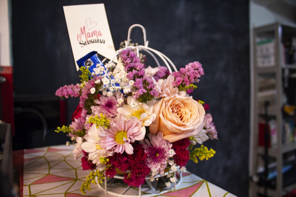 a bouquet of flowers sitting on top of a table