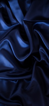 a close up of a dark blue fabric