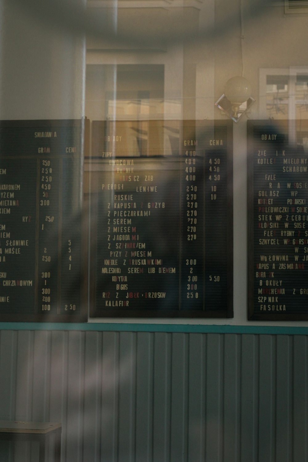 a restaurant with menus on the wall