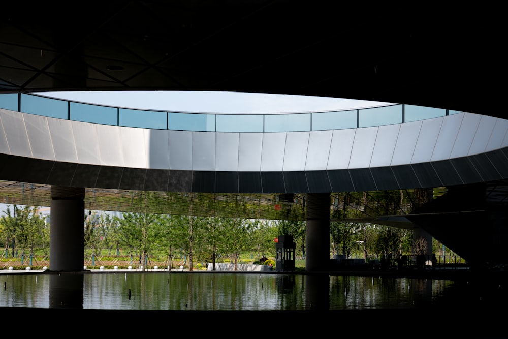 a circular building with a glass window on top of it