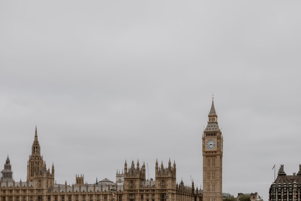 a large clock tower towering over a city