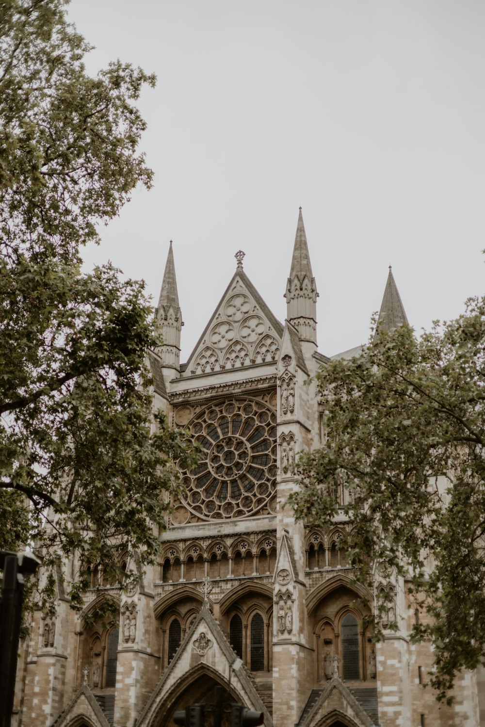 a large cathedral with a clock on the front of it