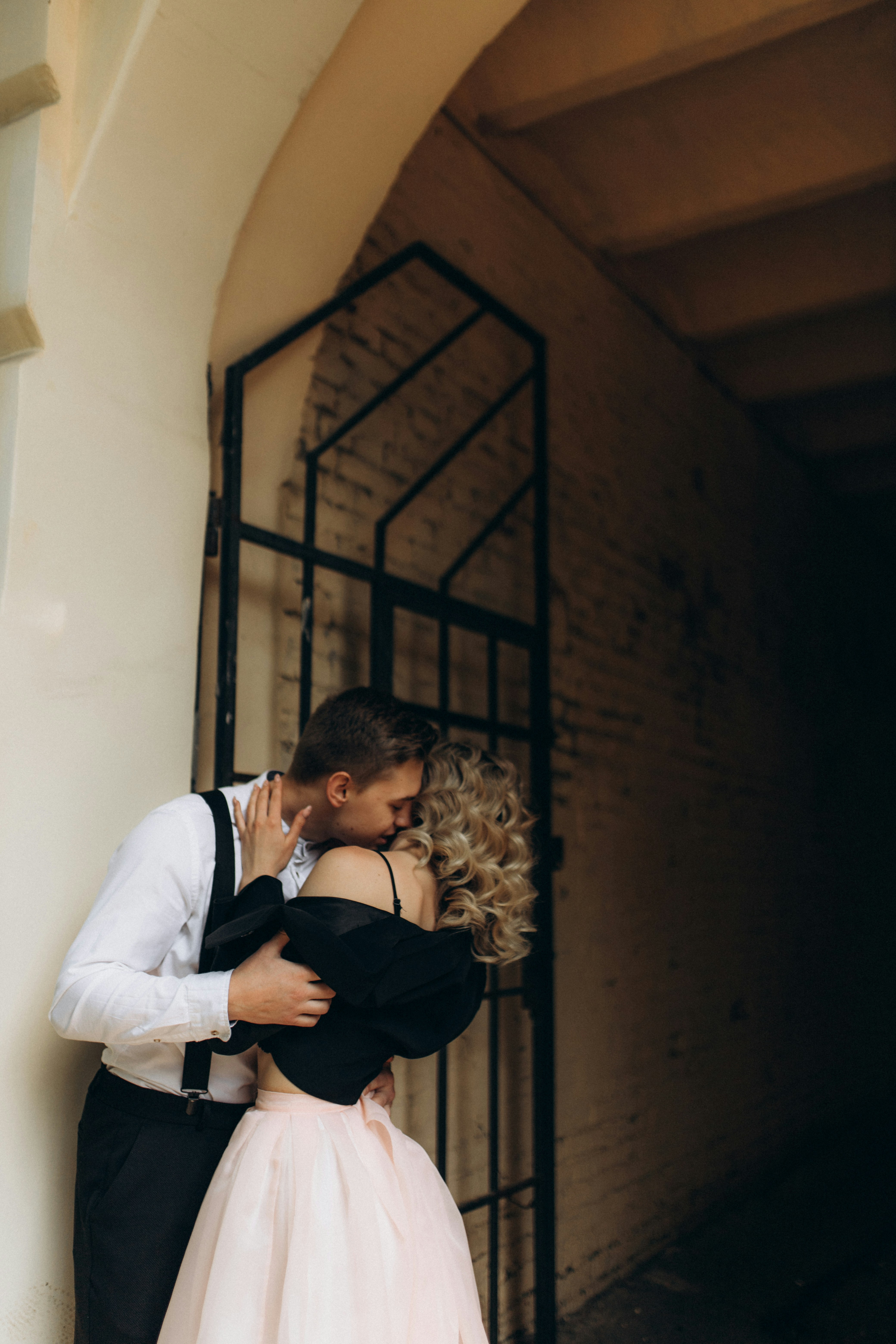 a man and a woman standing next to each other