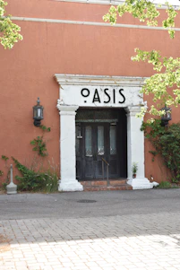 Modern storefront of oasisfullservice with clear signage and welcoming entrance in Ossining.