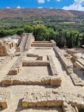 an aerial view of the ruins of a roman city