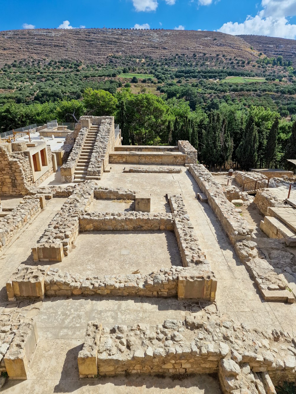 an aerial view of the ruins of a roman city