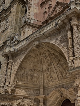 Installation of marble facades on a building exterior with skilled craftsmanship.