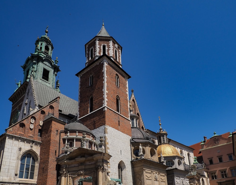 a large brick building with a clock tower