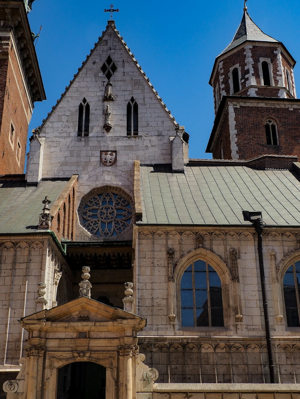 a church with two towers and a clock