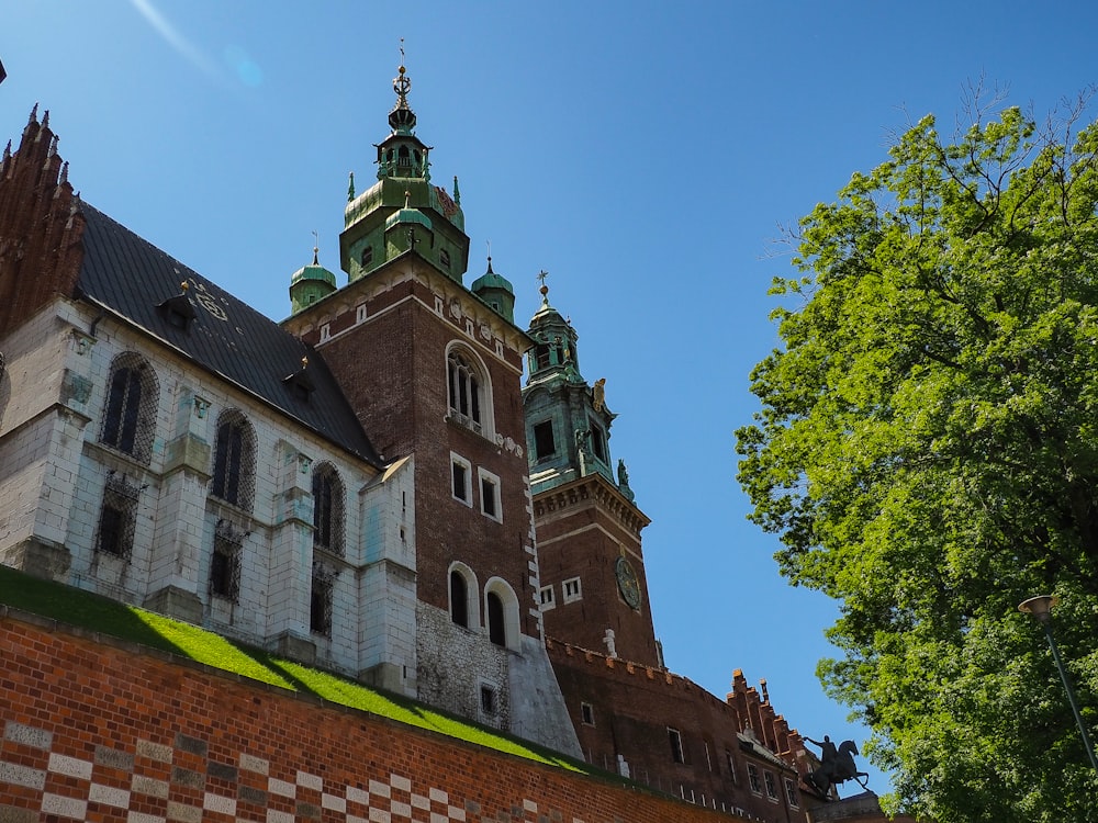 a large brick building with a clock tower