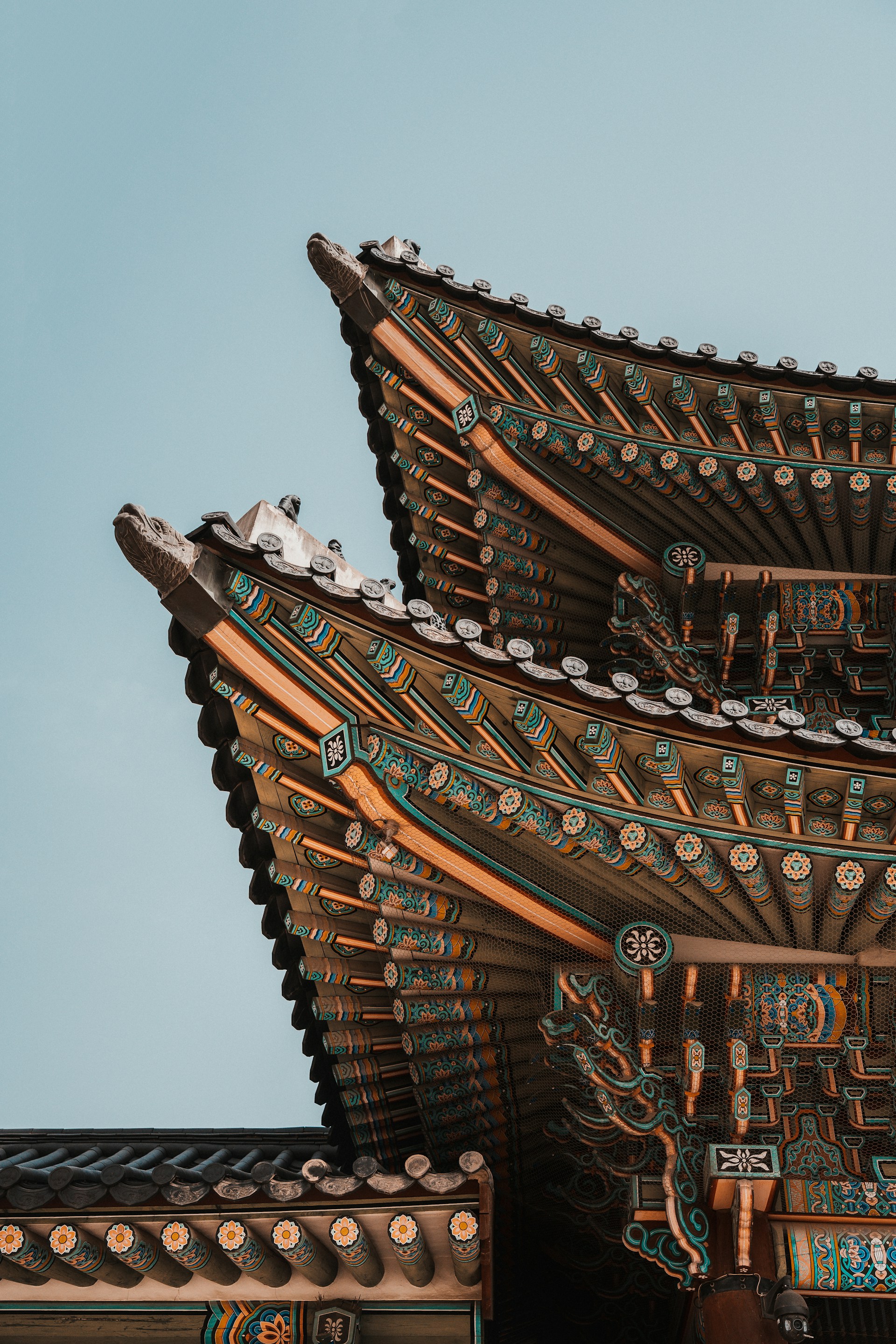 a close up of a building with a sky background
