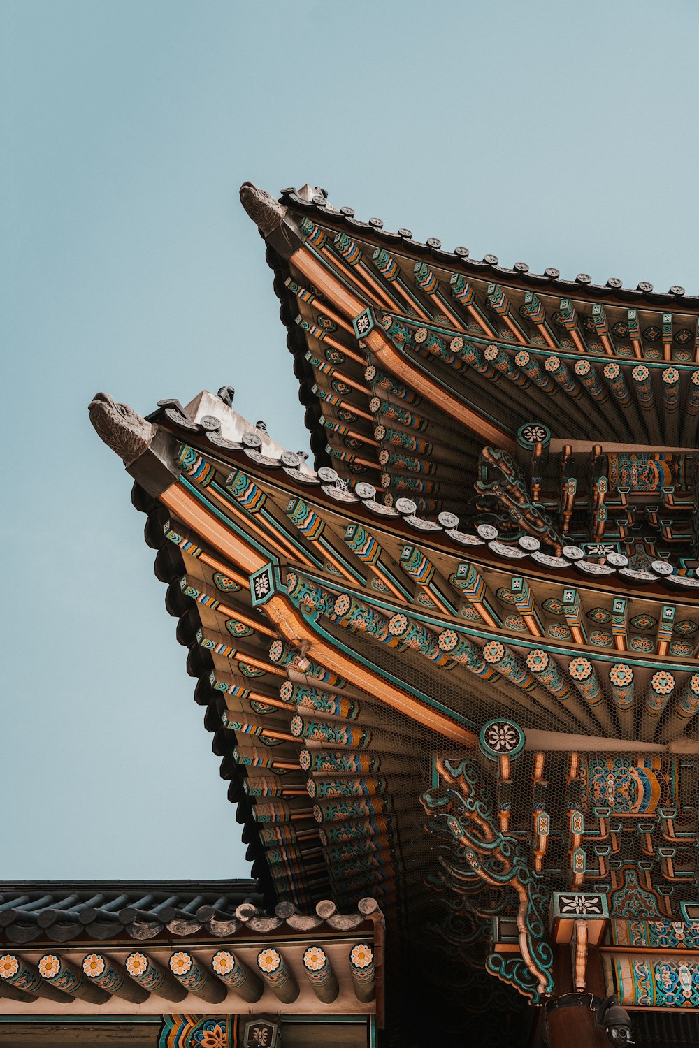 a close up of a building with a sky background