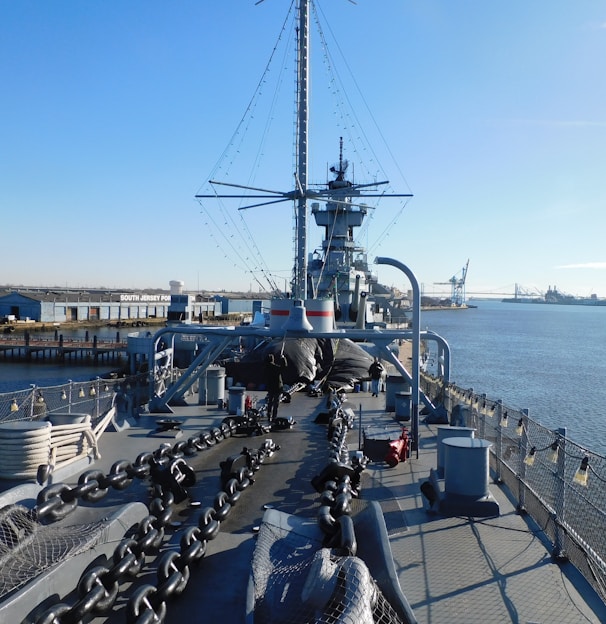 a large ship is docked in the water