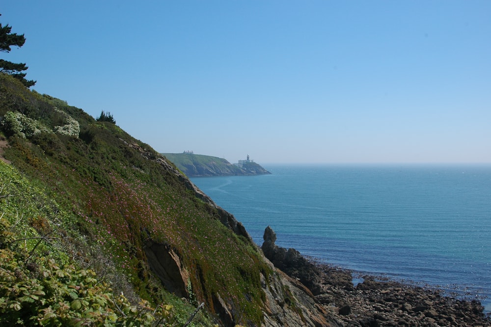 a view of the ocean from a cliff