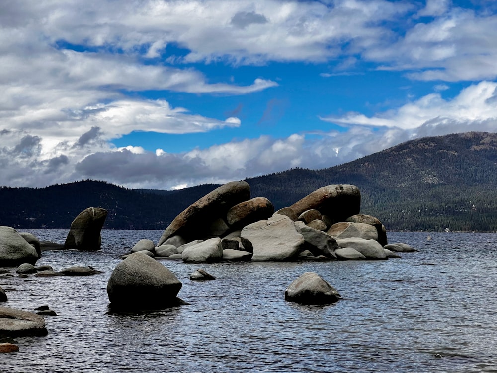 a large body of water surrounded by rocks