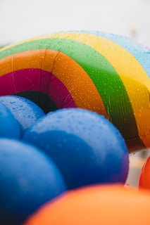 A colorful assortment of personalized birthday balloons.