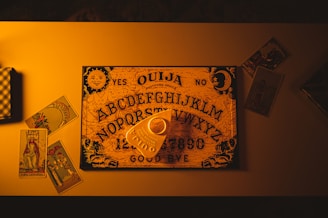 a picture of a key and some cards on a table