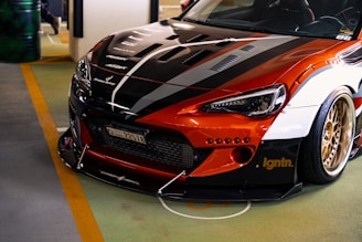 A sleek automobile showcasing custom parts designed by Biggfella.
