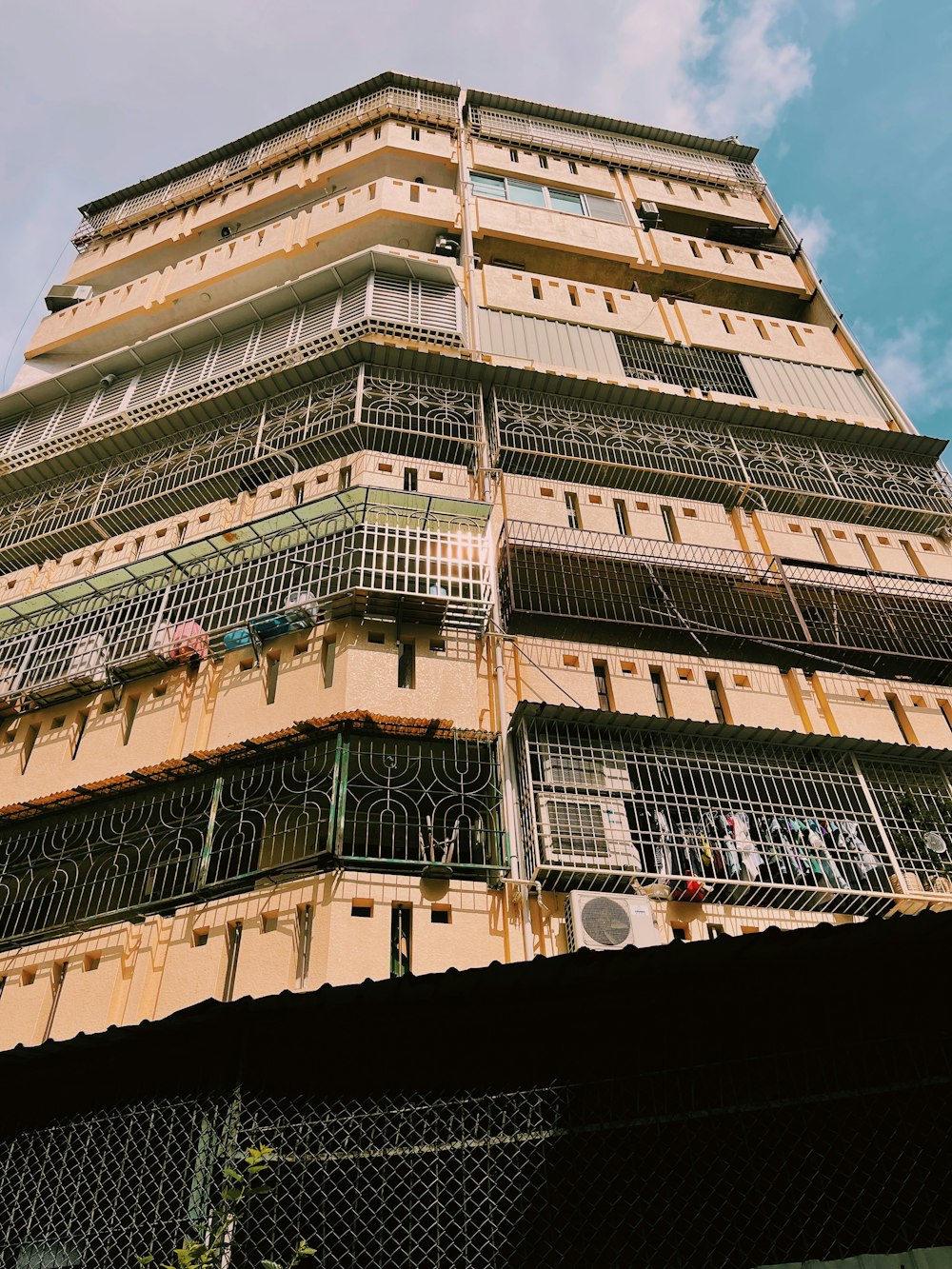 a tall building with balconies and balconies on it