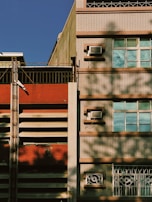 Facade of a mixed-use building blending traditional and modern architectural elements.