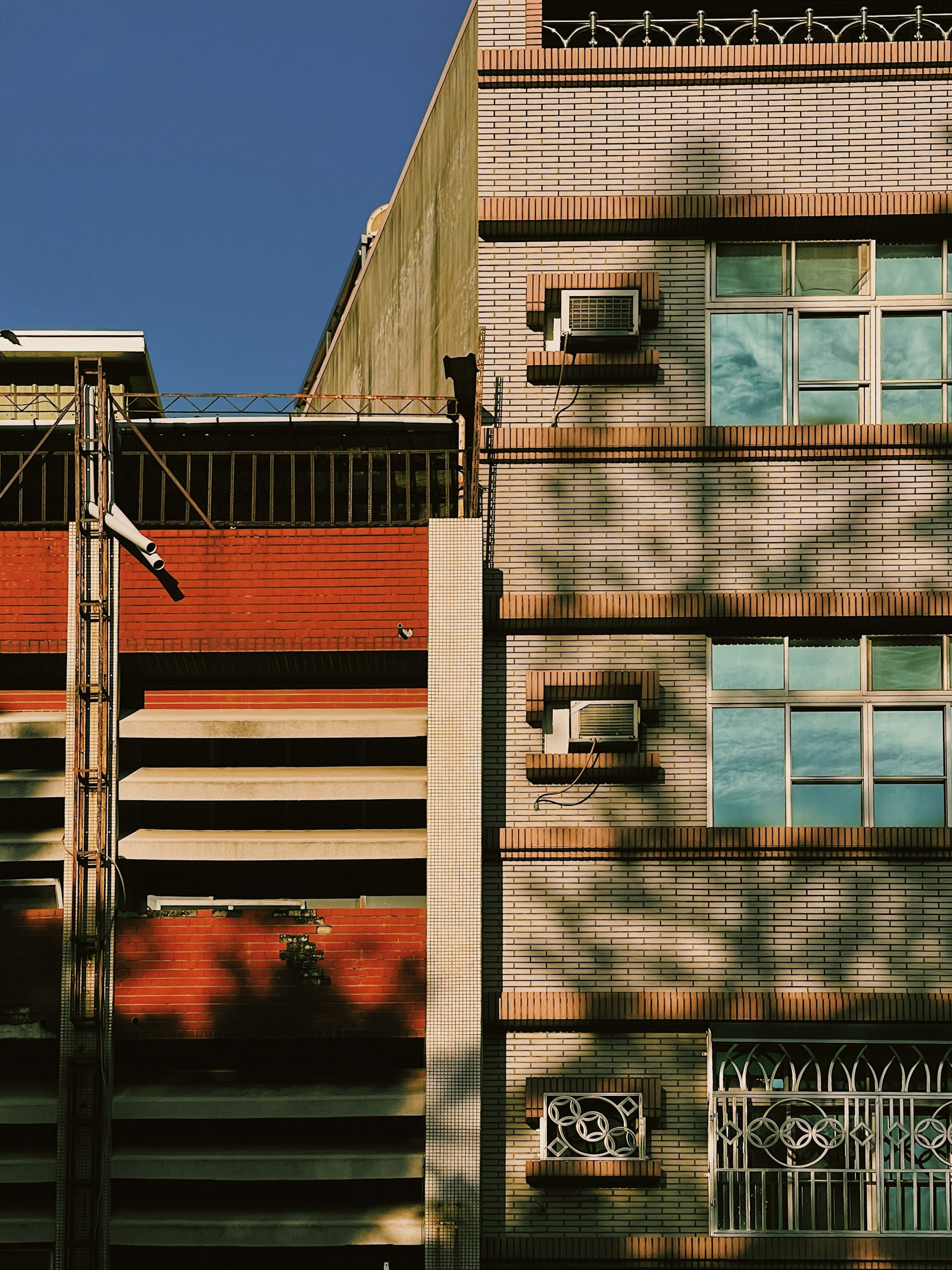 black and brown leather padded tub sofa