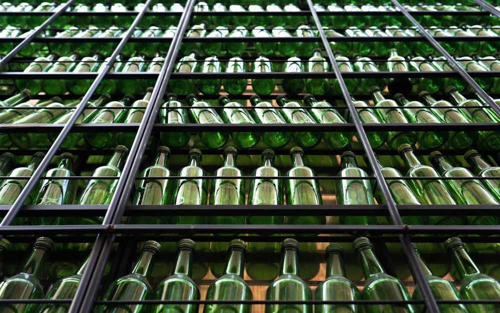 a bunch of bottles that are sitting on a shelf