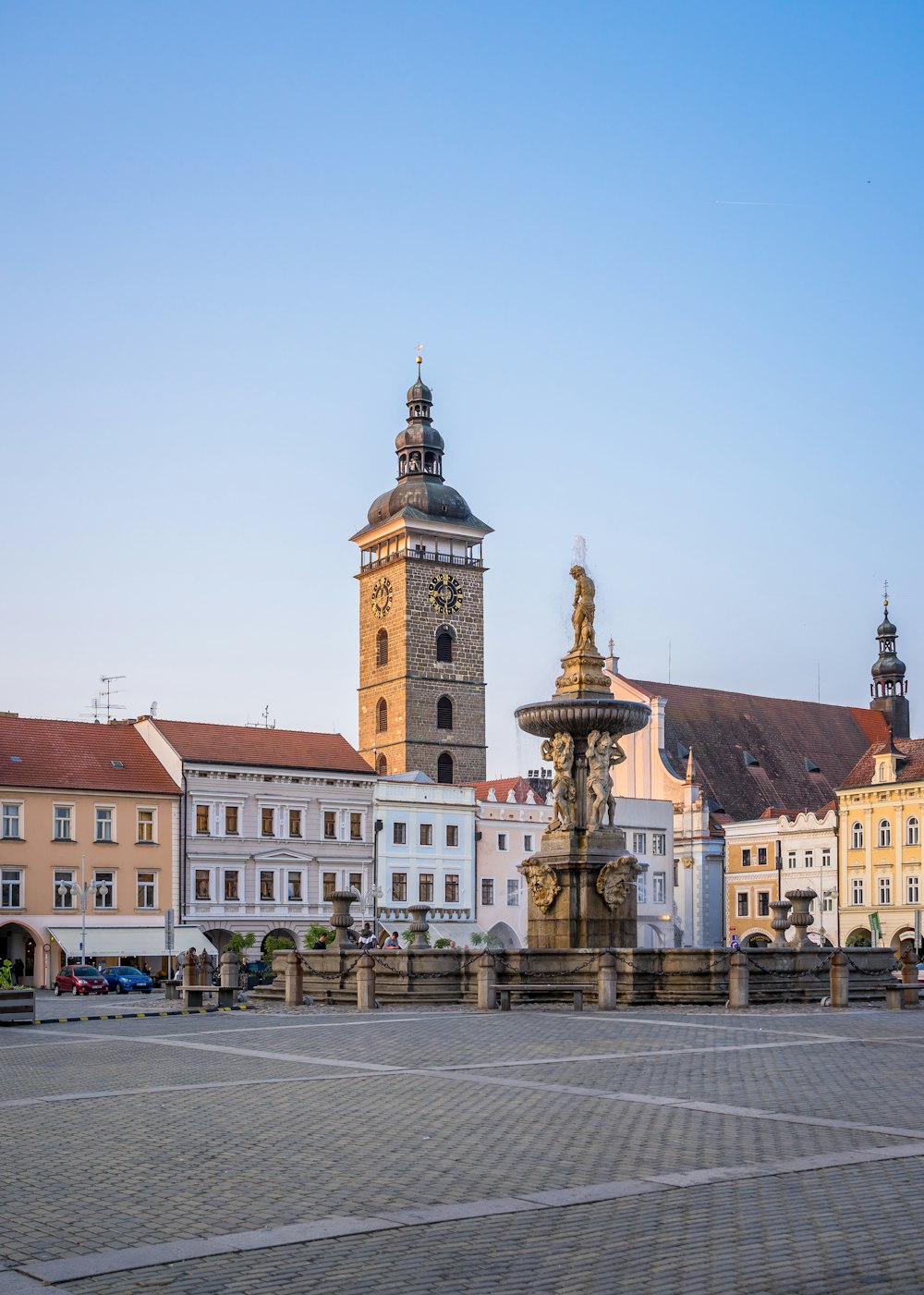 a large clock tower towering over a city