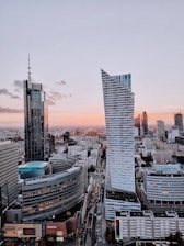 an aerial view of a city with tall buildings