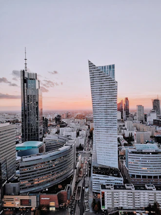 an aerial view of a city with tall buildings