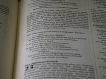 Close-up of white page with black text in a neat font