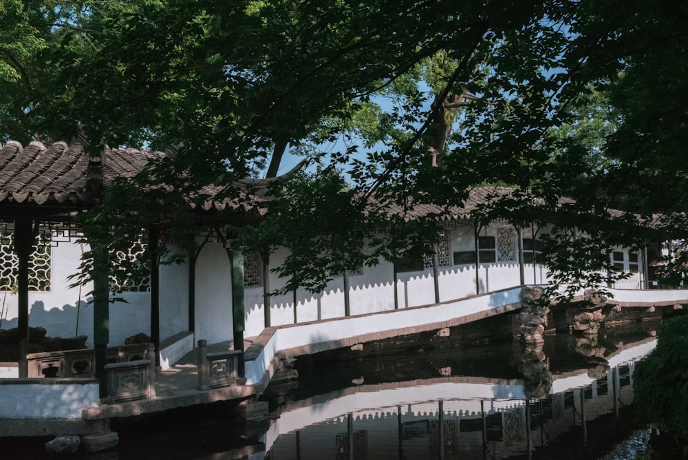 a building with a bridge over a body of water