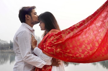 a man and a woman standing next to each other