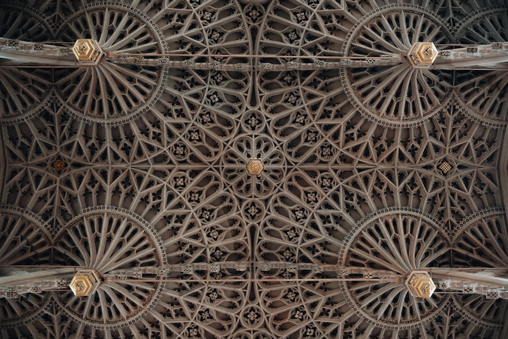 a close up view of a decorative ceiling in a building