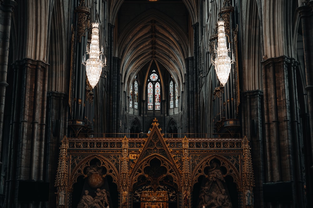 a large cathedral with chandeliers hanging from the ceiling