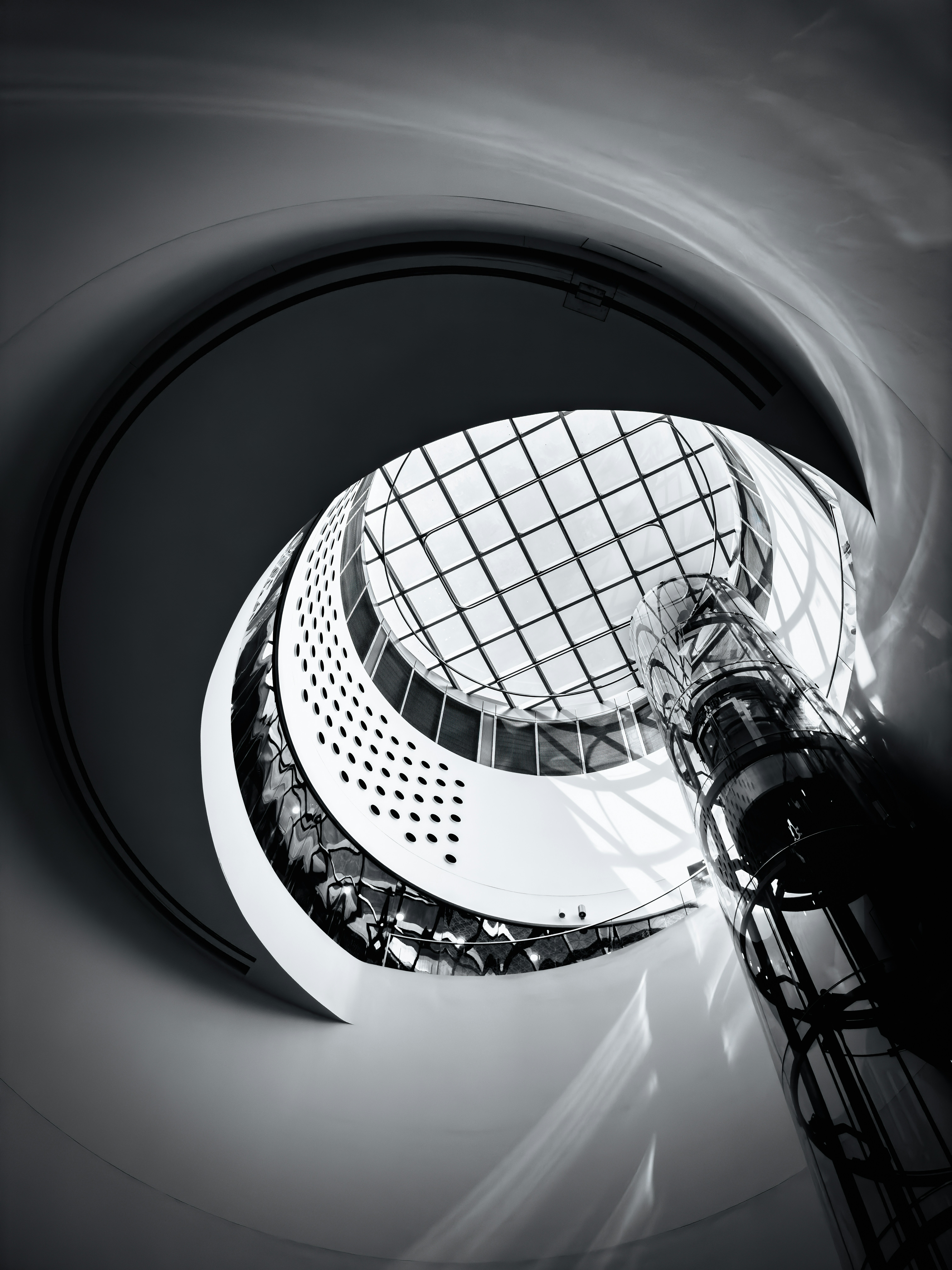 a black and white photo of a circular object