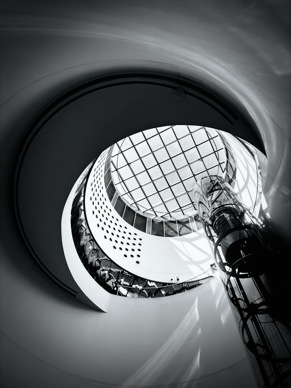 a black and white photo of a circular object